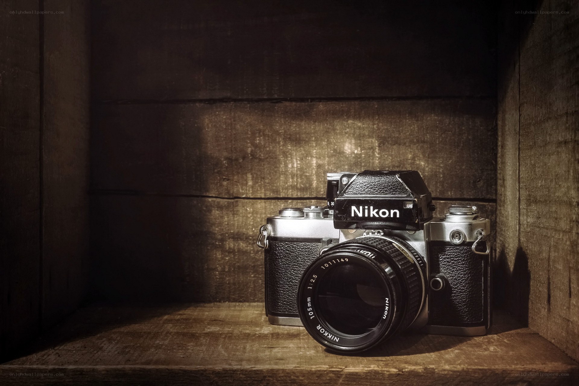 vintage nikon camera in wooden box