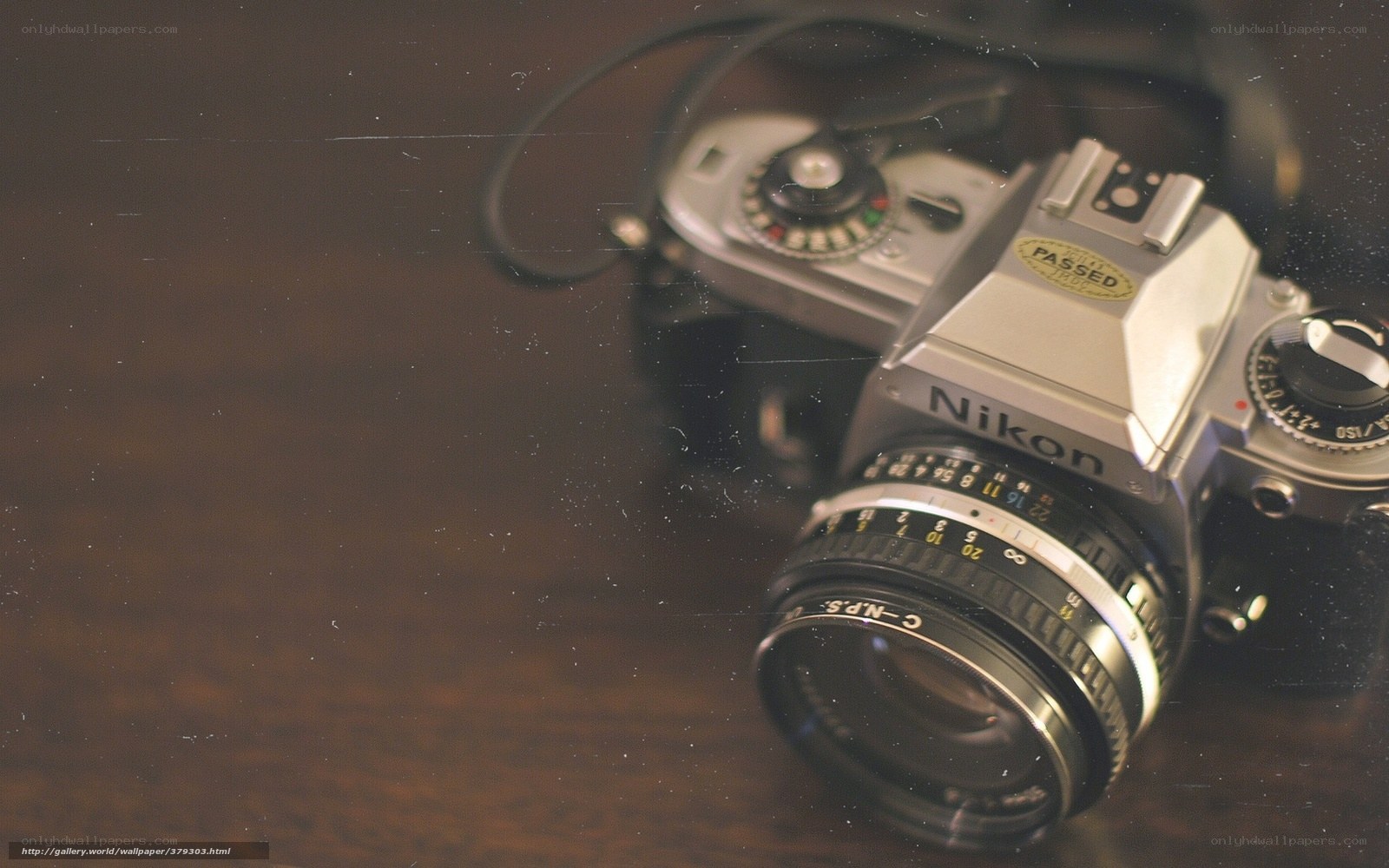 vintage nikon camera on wood