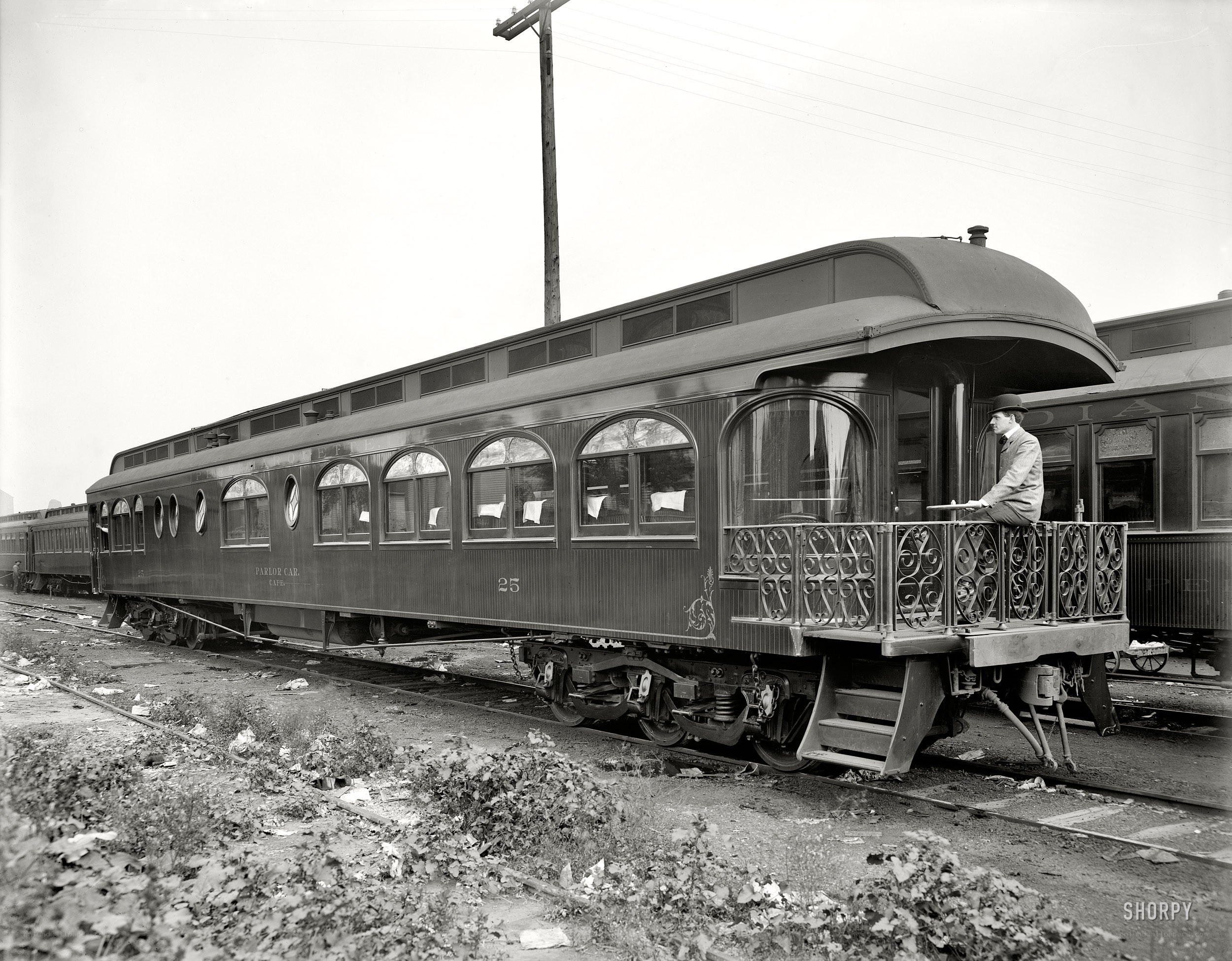 Vintage parlor car on tracks