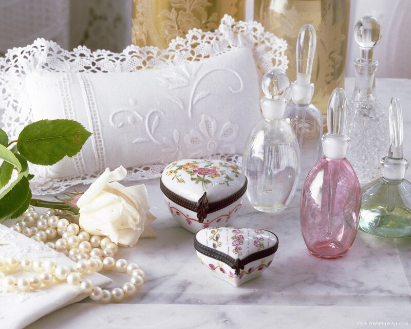 Vintage perfume and jewelry display