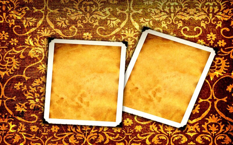 vintage photo frames on patterned background