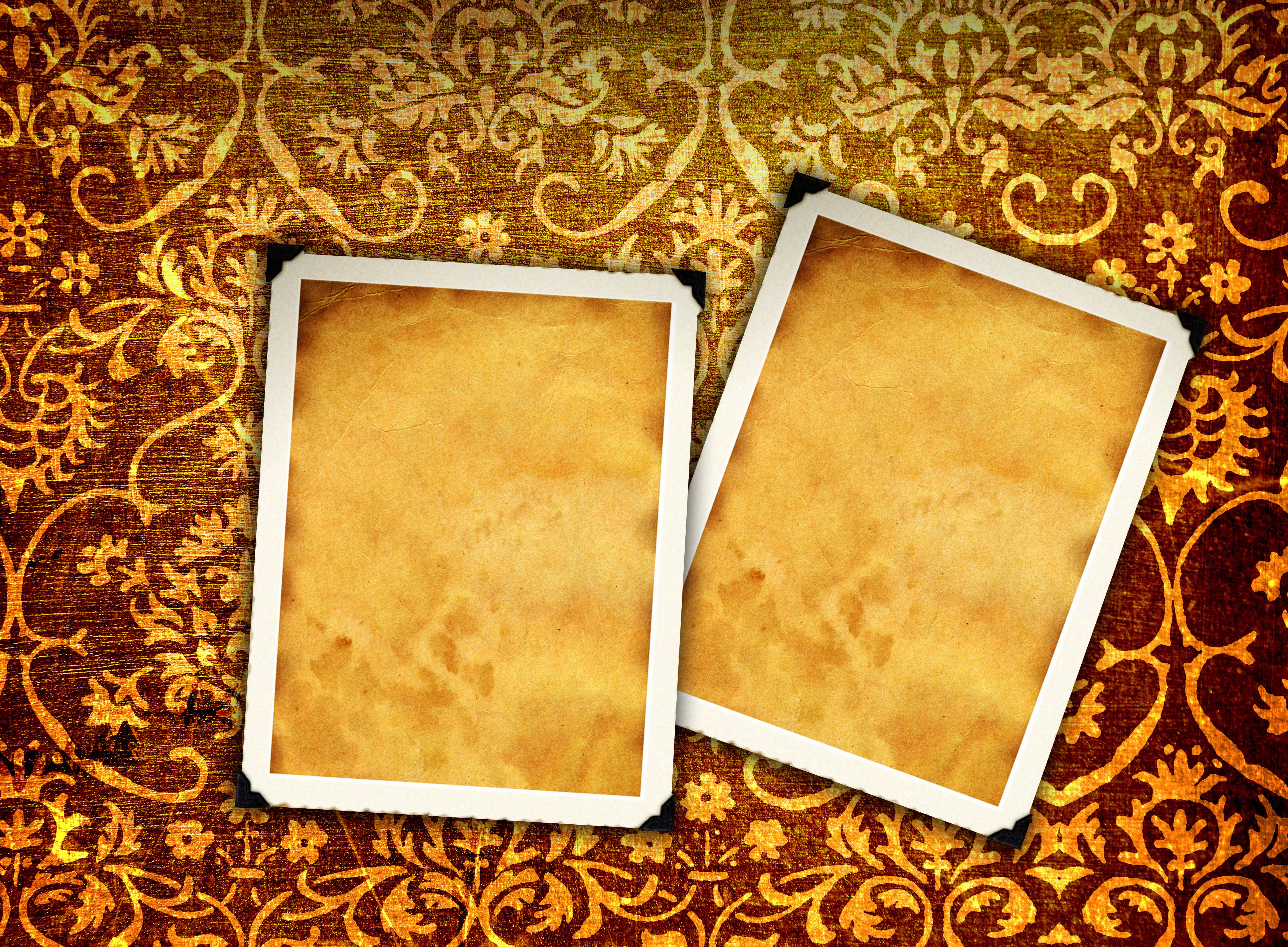 vintage photo frames on patterned background