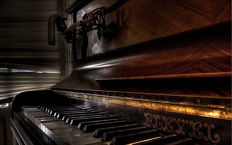 vintage piano in dim light