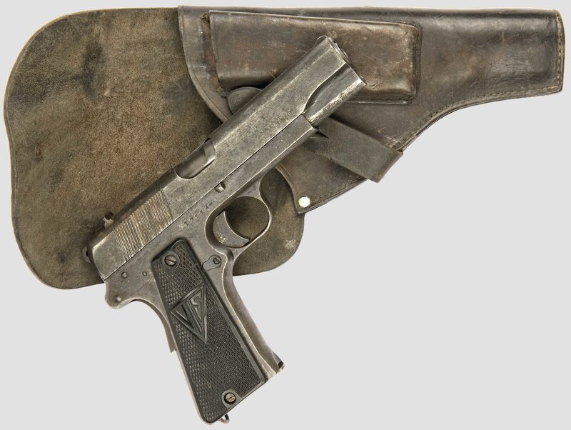 Vintage pistol with leather holster