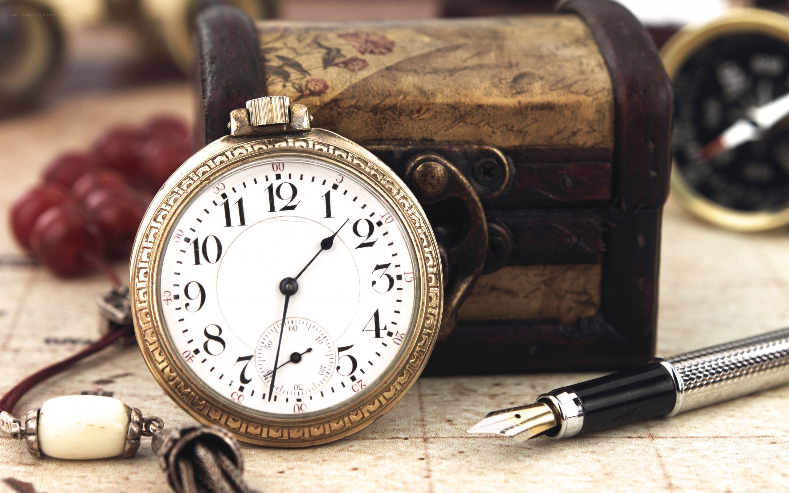 vintage pocket watch and compass