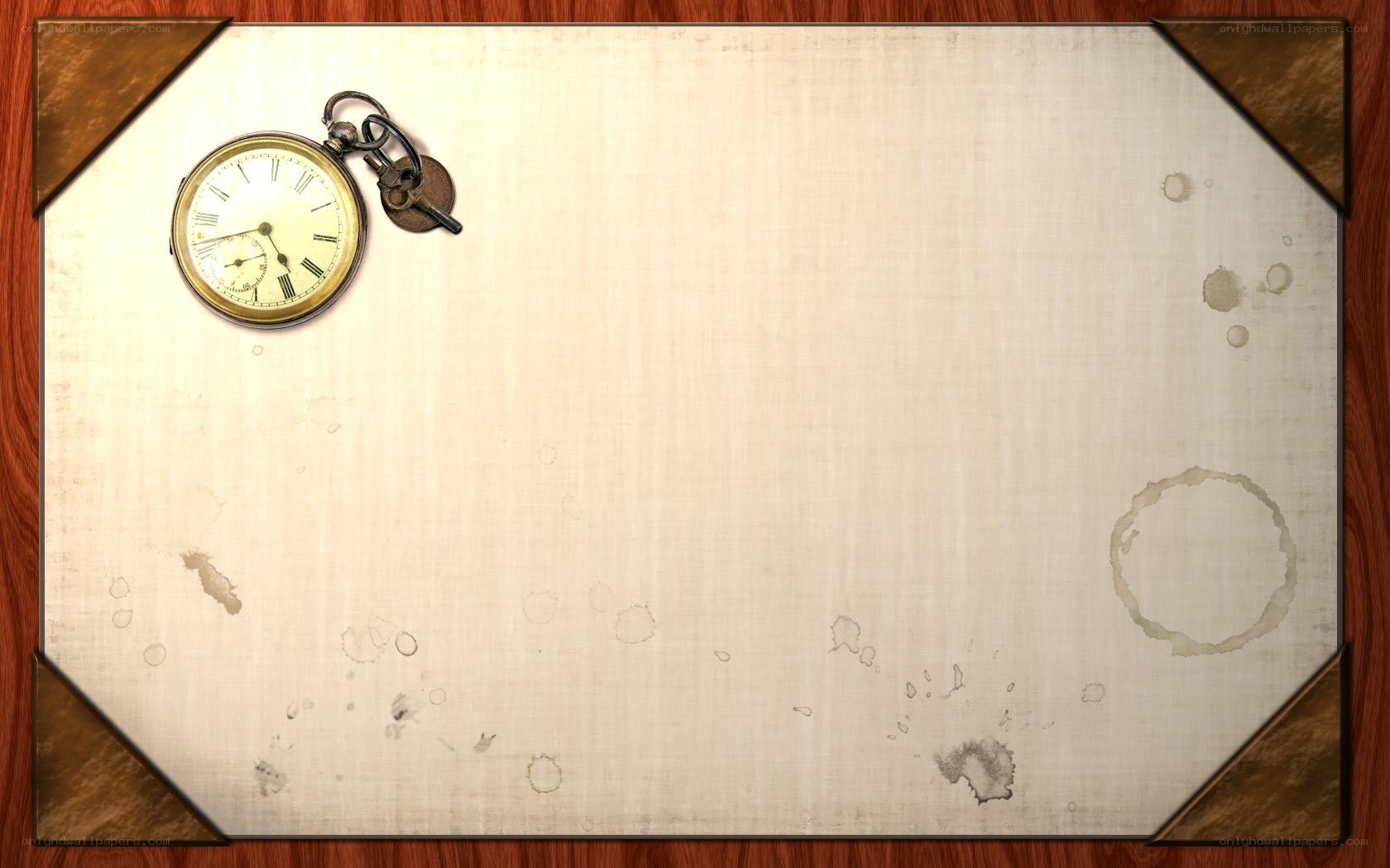 vintage pocket watch on aged paper