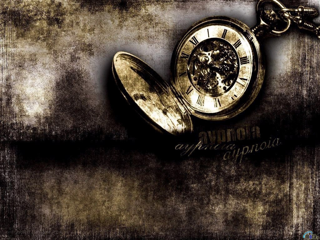 vintage pocket watch on grunge background