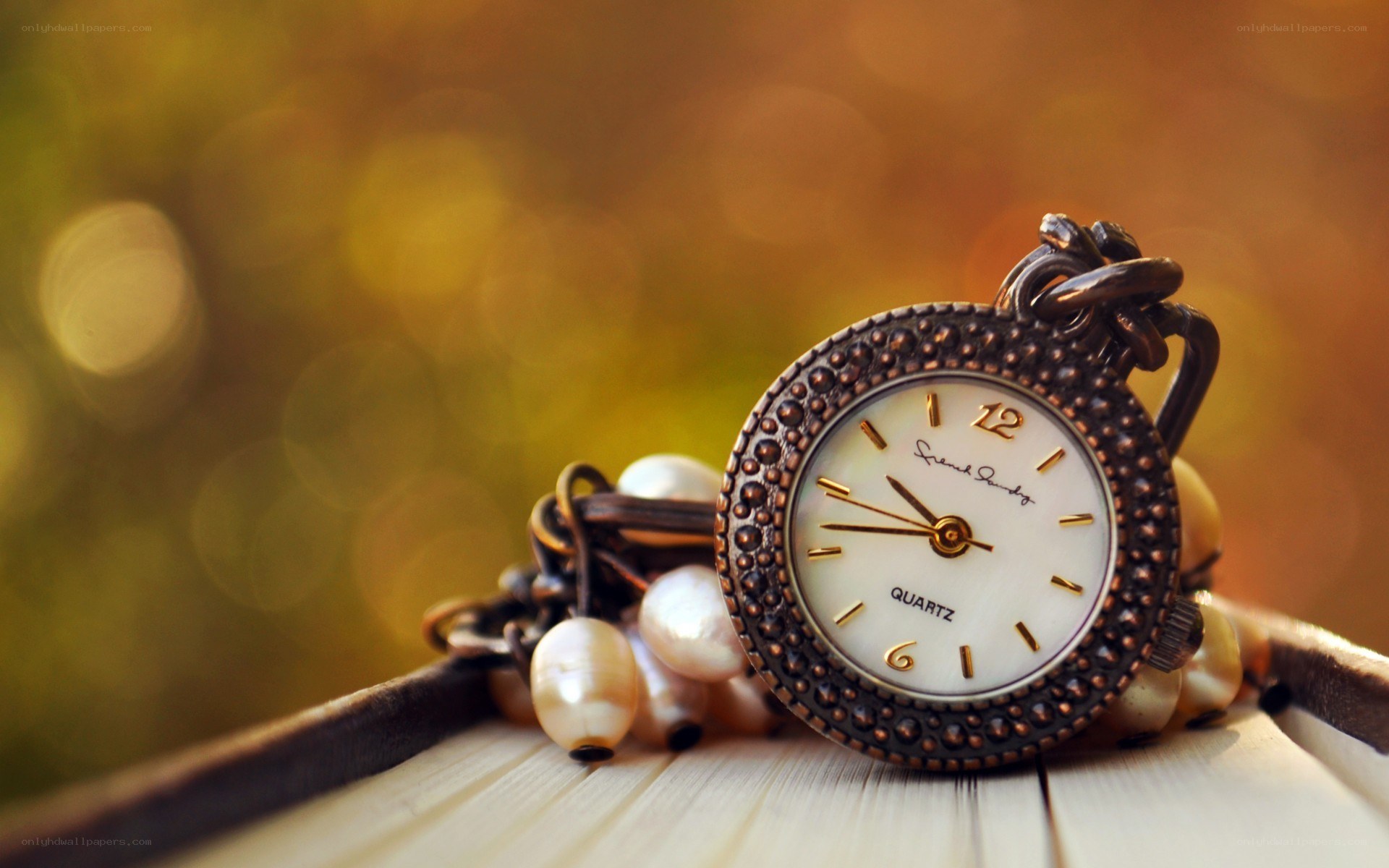 vintage pocket watch with pearls