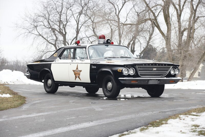 vintage police car on road