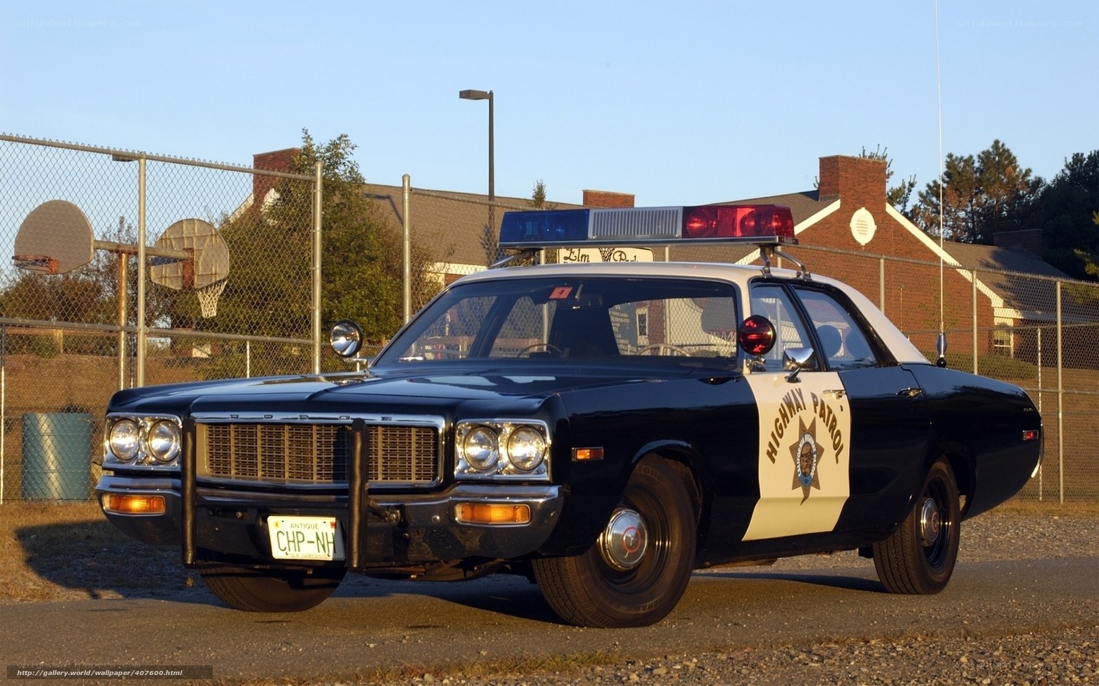 vintage police car parked outside