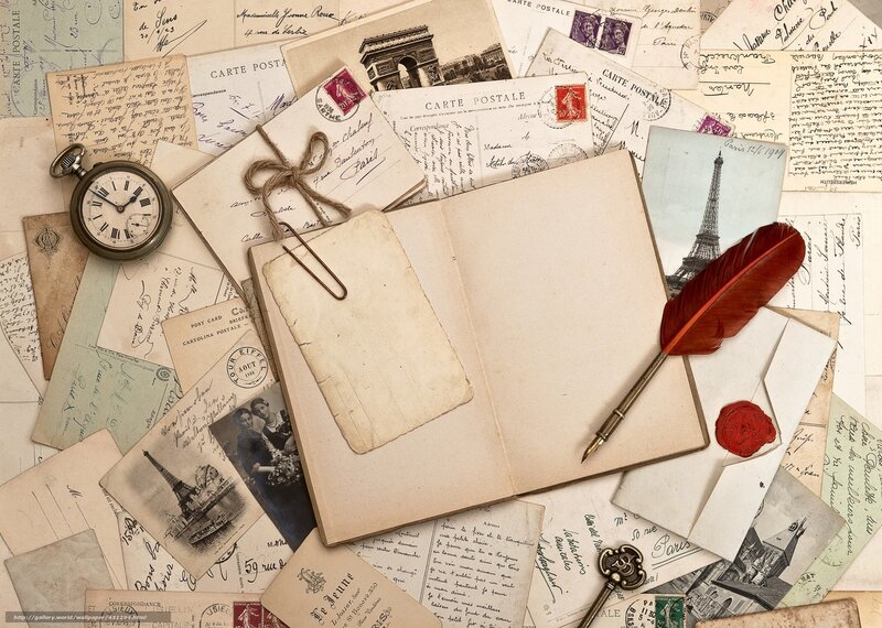 Vintage postcards and writing tools