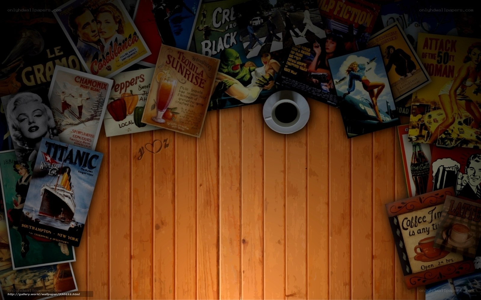 vintage posters on wood wall