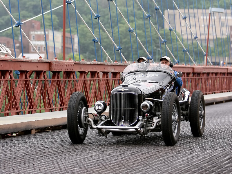 Vintage race car on a bridge