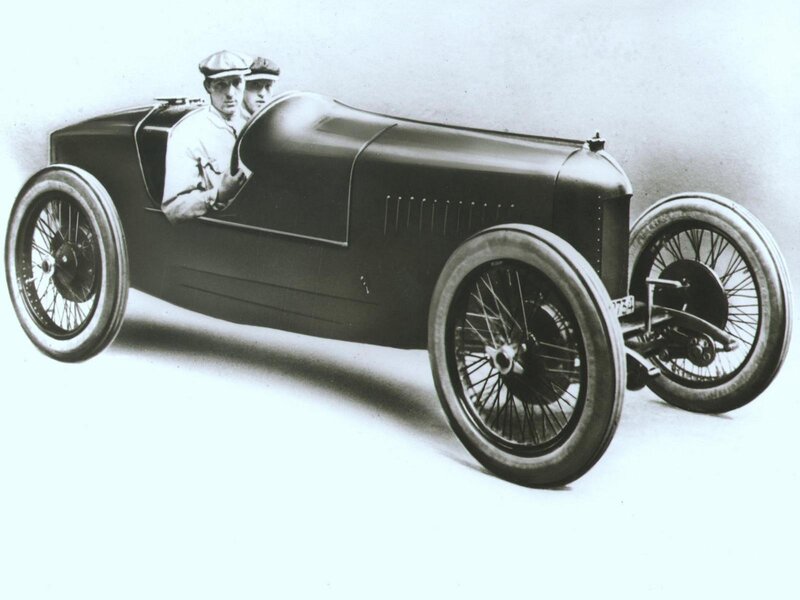 Vintage race car with two occupants