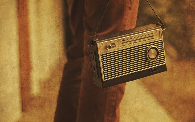 vintage radio hanging on strap