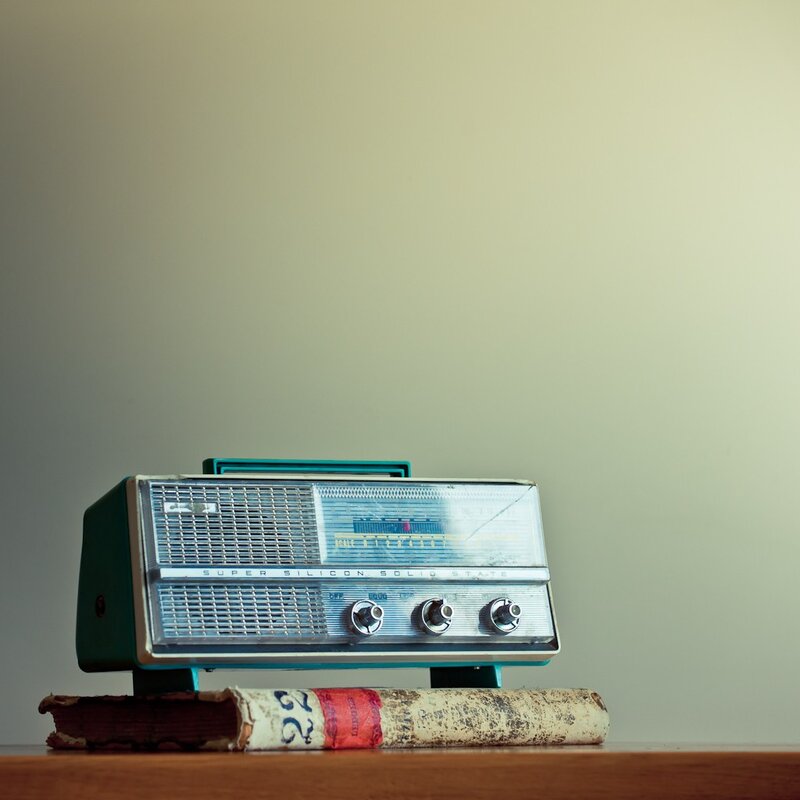 vintage radio on old book