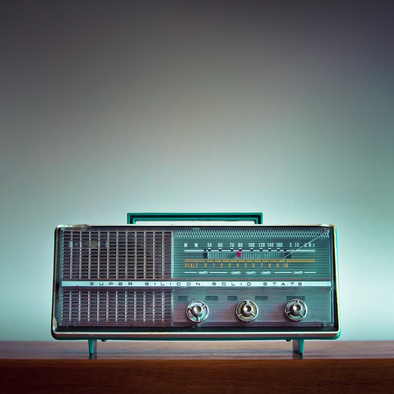 vintage radio on wooden surface