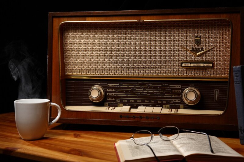 vintage radio with coffee and book