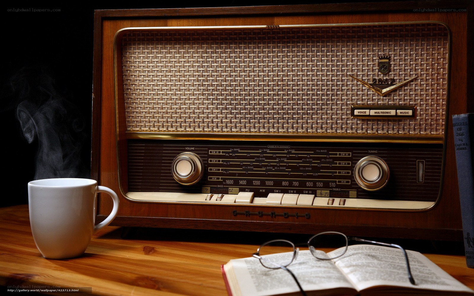 Vintage radio with coffee and book