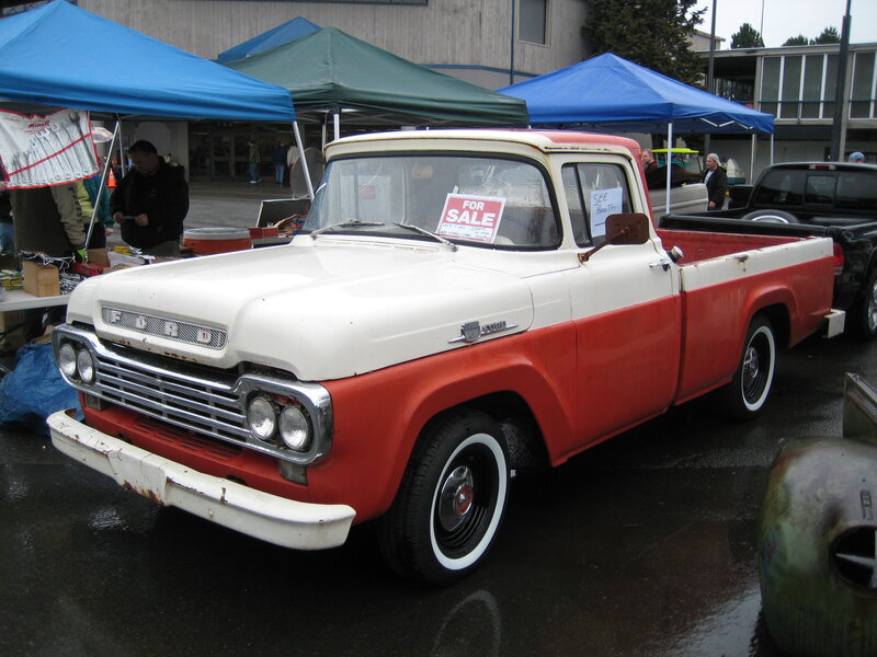 Vintage red and white Ford pickup truck