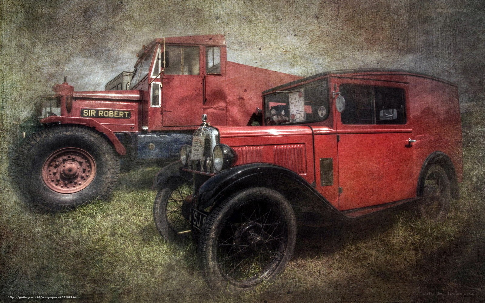 Vintage red vehicles on grass