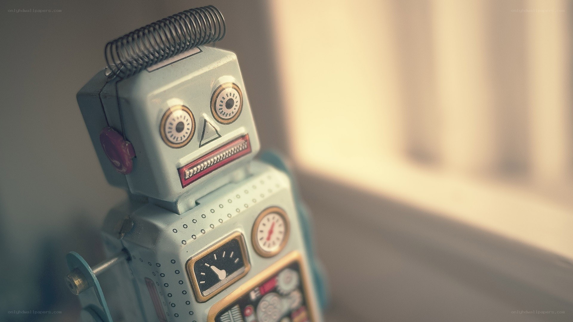 vintage robot toy by window