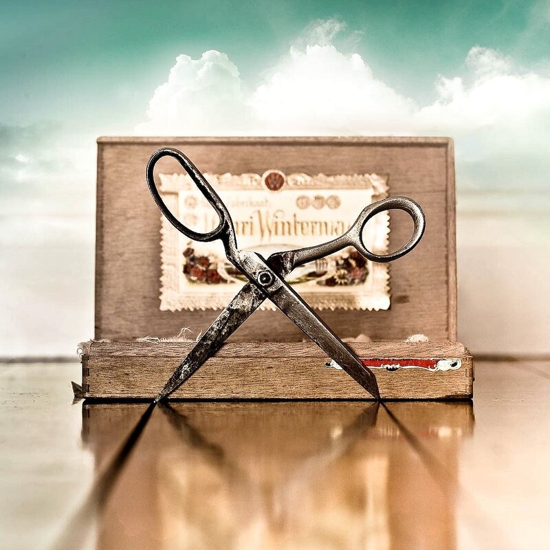 Vintage scissors on wooden box