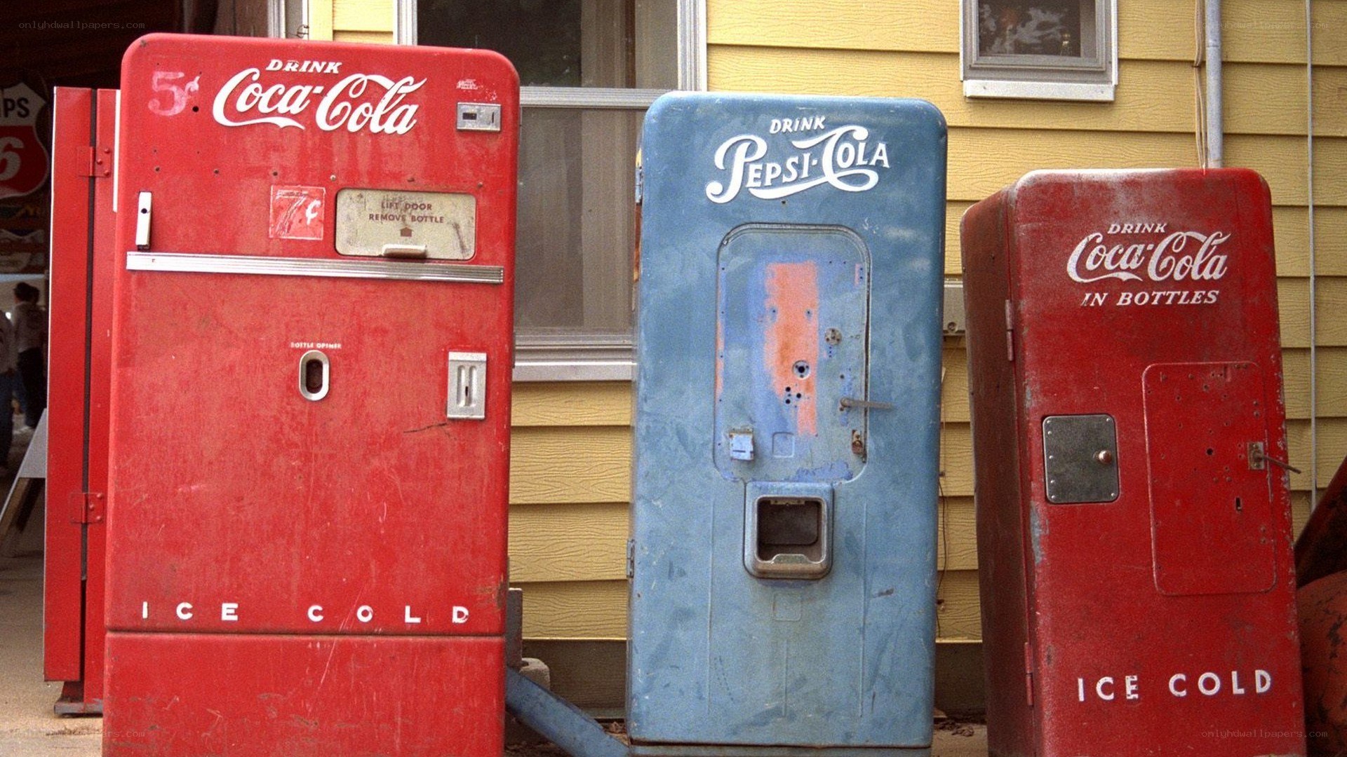 vintage soda machines outside