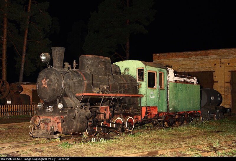 Vintage steam locomotive at night