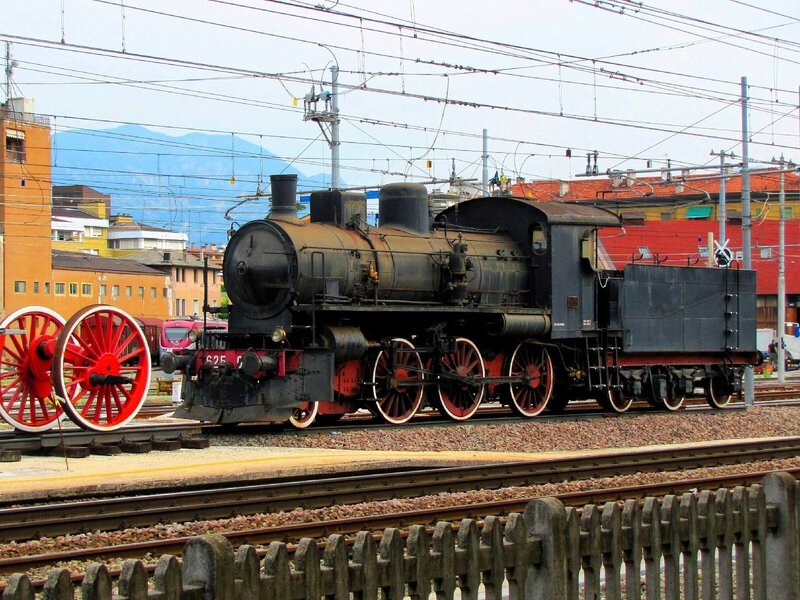 Vintage steam locomotive at station
