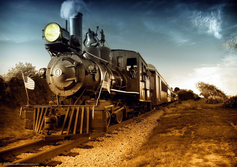 Vintage steam train at sunset