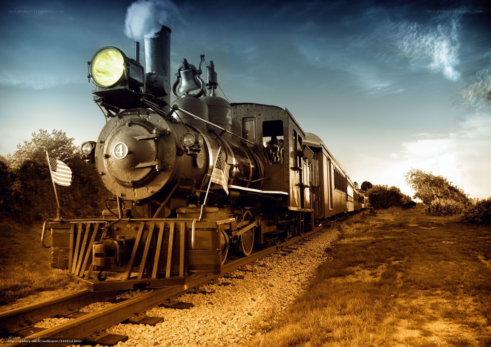 Vintage steam train at sunset