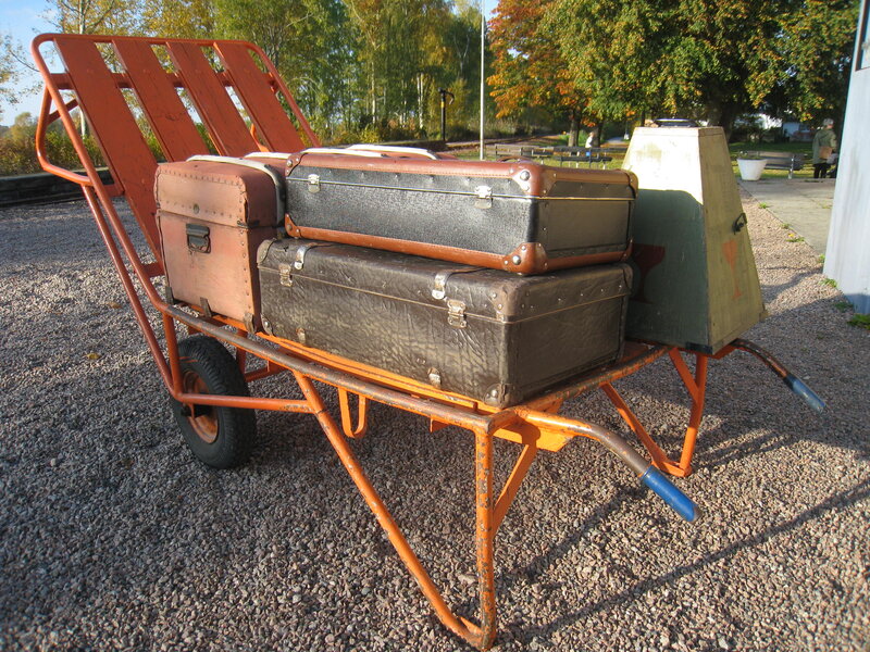 Vintage Suitcases on Cart