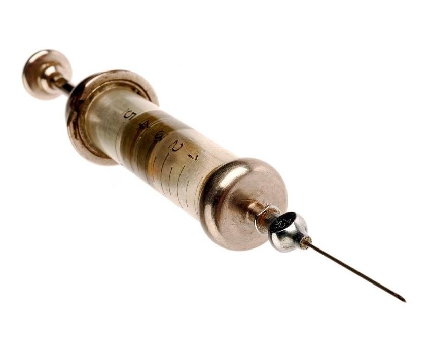 vintage syringe with needle