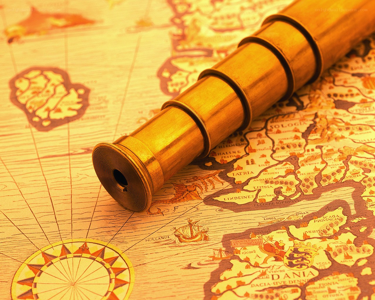 Vintage telescope on old map
