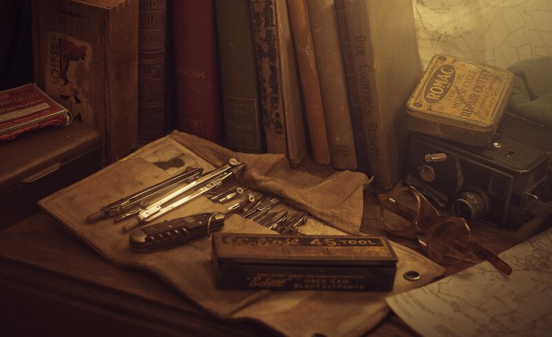Vintage tools and books on a desk