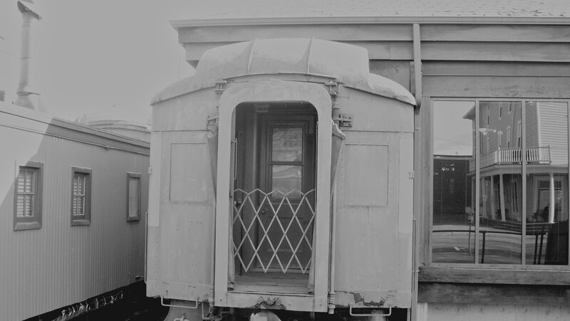 vintage train car at a station