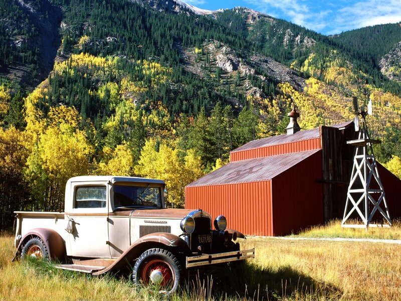 Vintage truck in autumn mountains