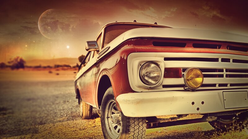Vintage truck in desert landscape
