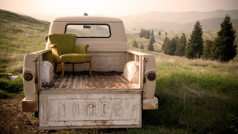 Vintage truck with green chair