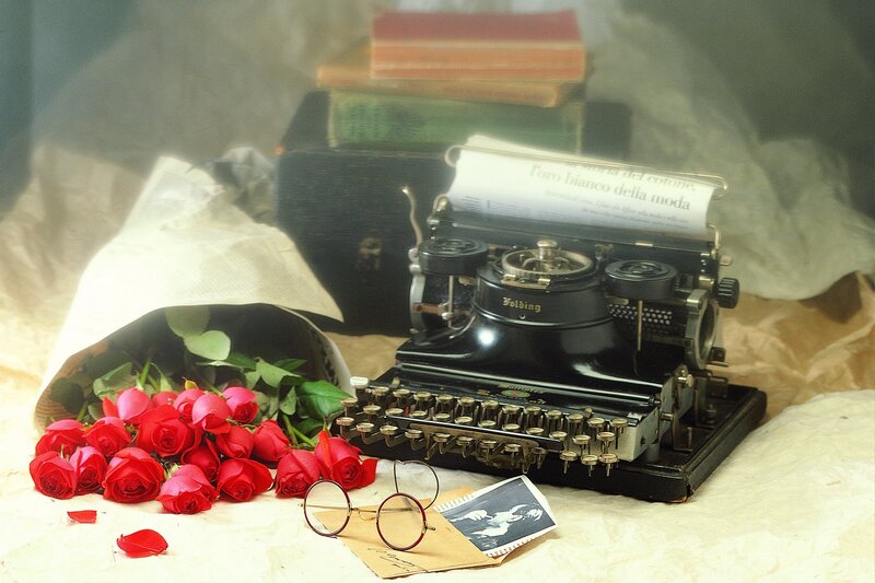 Vintage typewriter with roses