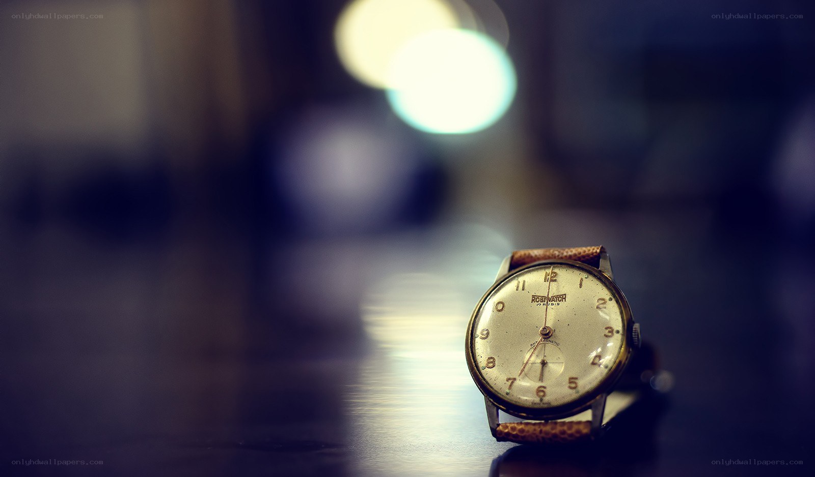 vintage watch on dark surface