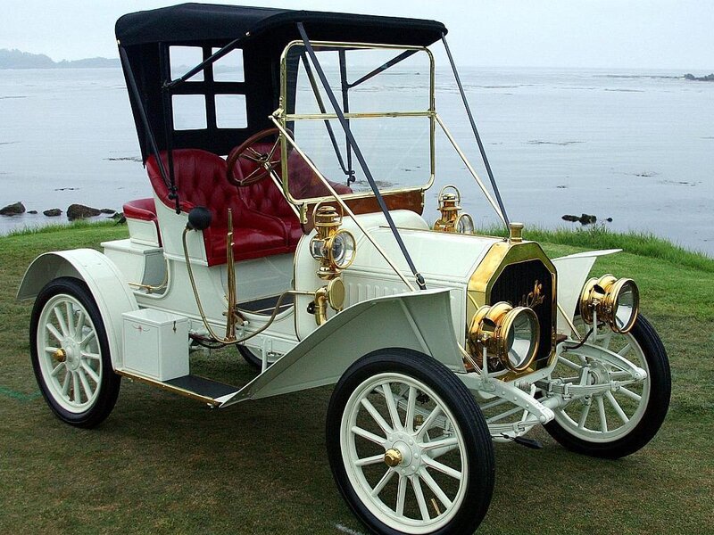 Vintage white car by the sea