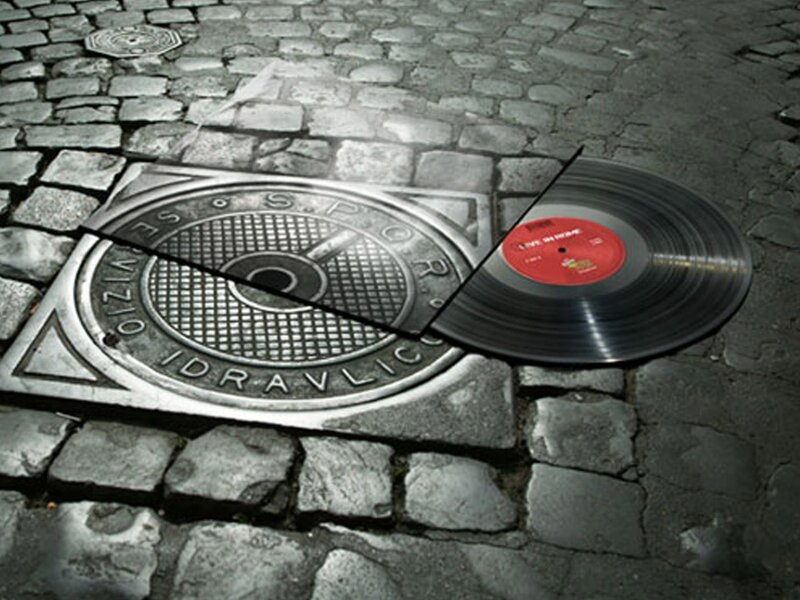 vinyl record on manhole cover