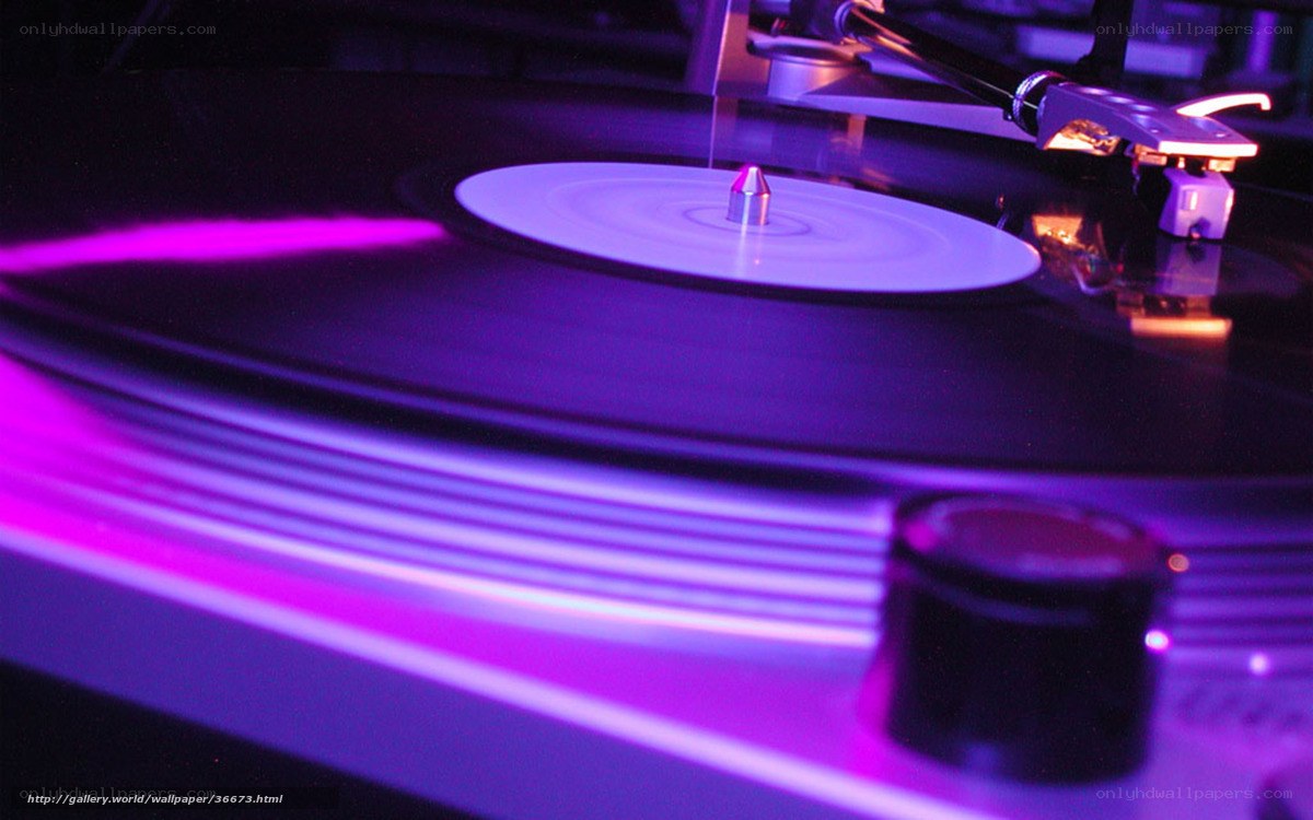 vinyl record player in purple light