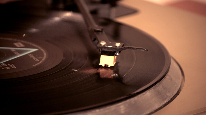 vinyl record player in use