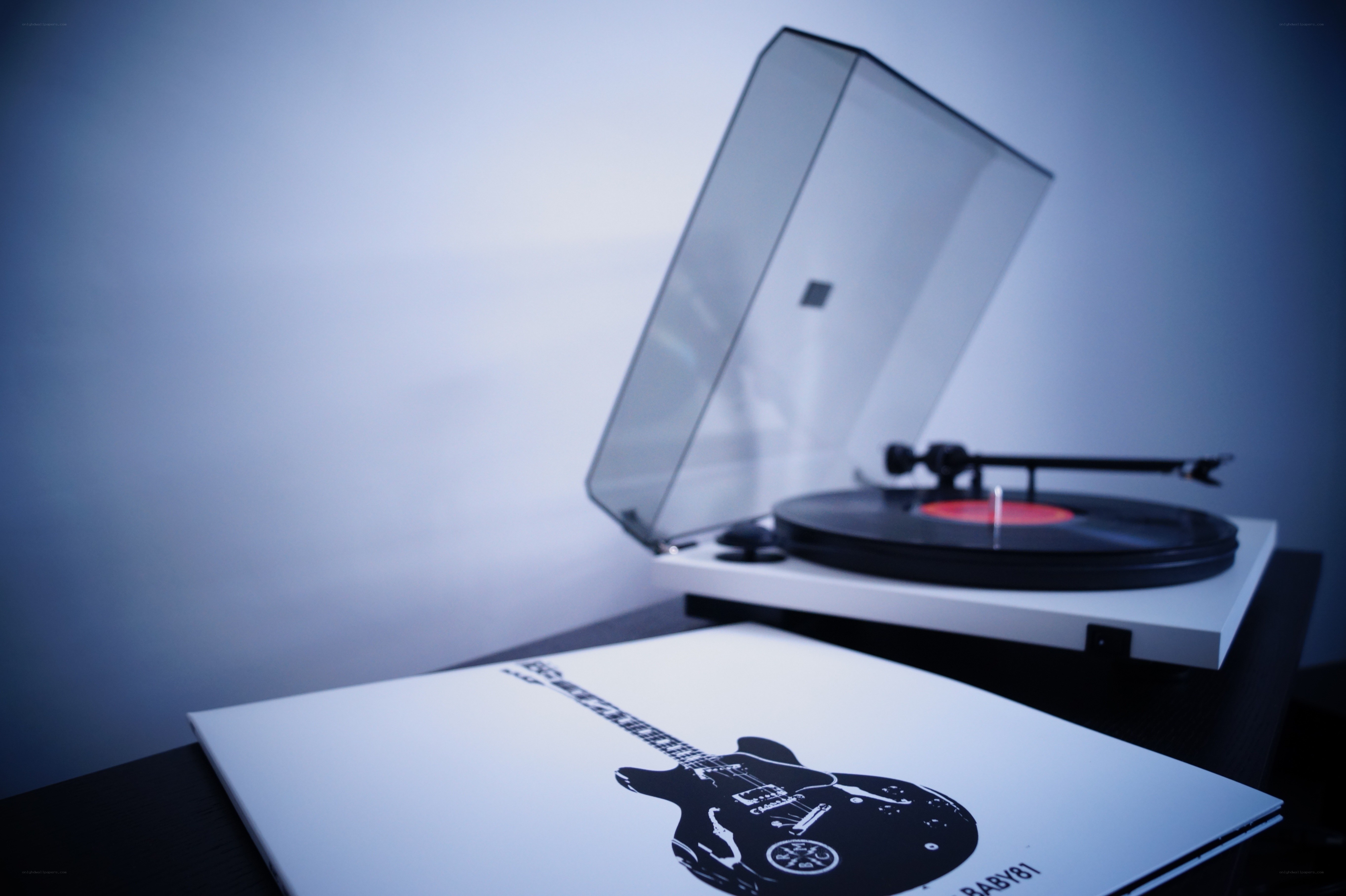 vinyl record player with album