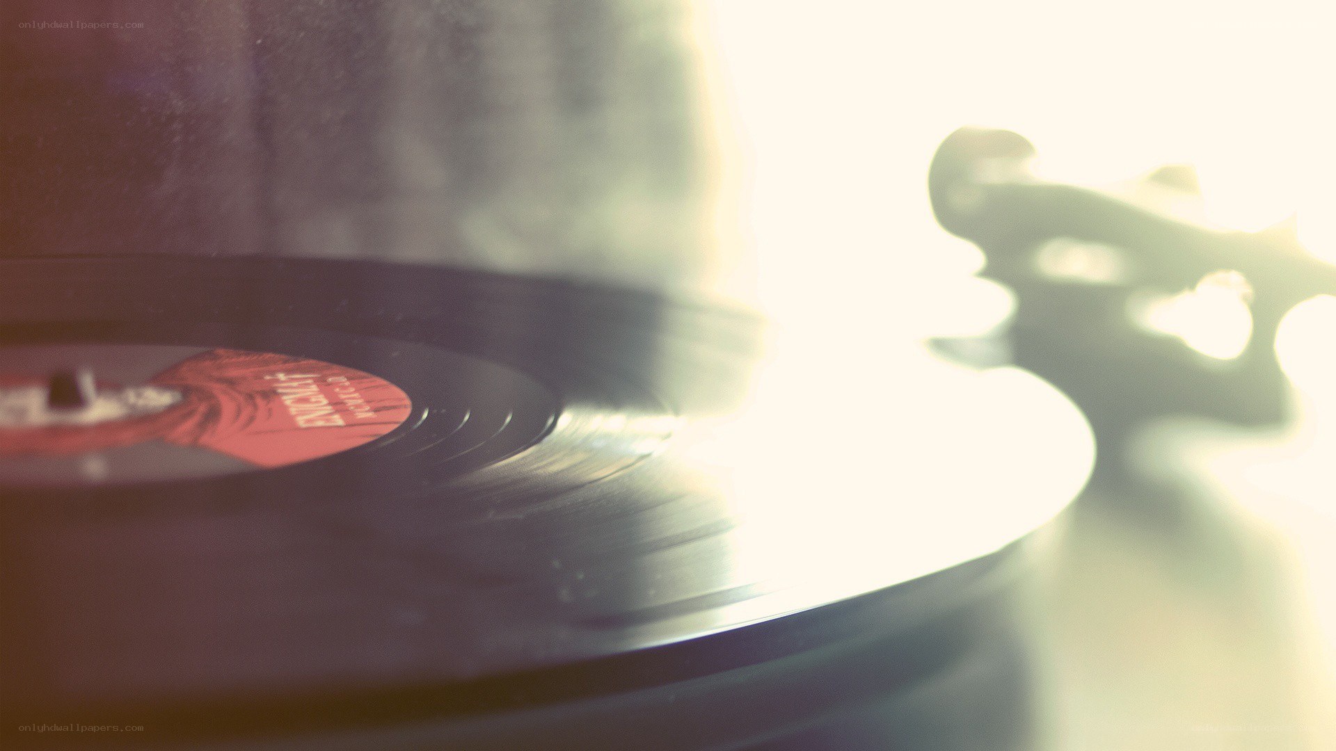 vinyl record playing on turntable