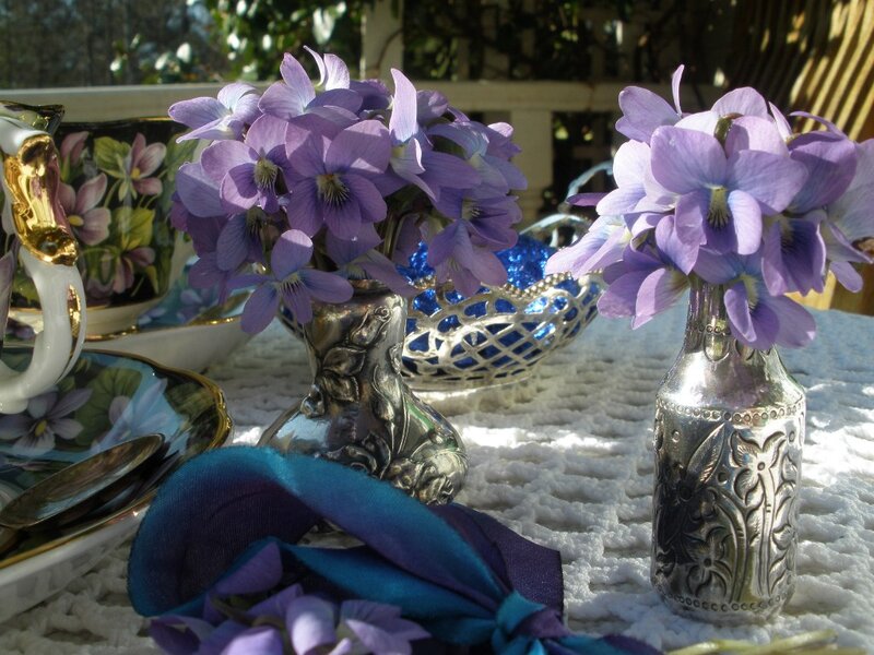 Violet Flowers in Silver Vases