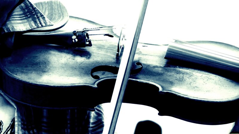 Violin and bow in blue light